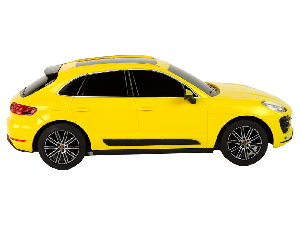 Carro telecomandado Porsche Macan Turbo Rastar amarelo 1:24