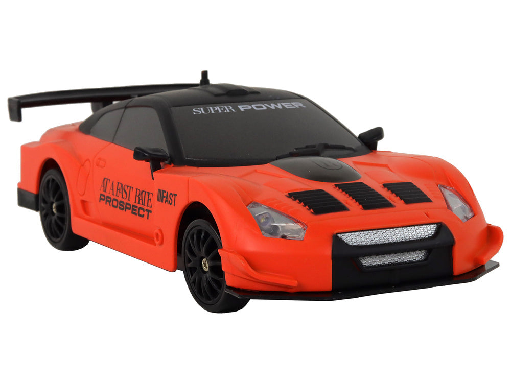 Carro Desportivo RC 1:24 Laranja com Rodas Intercambiáveis
