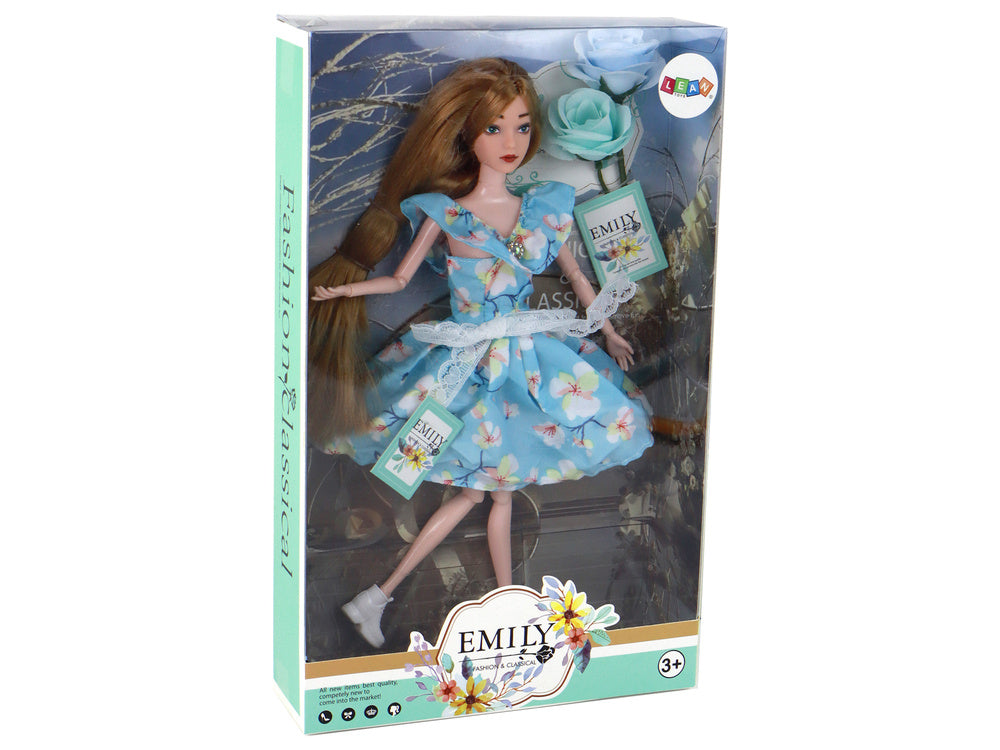 Boneca Emily primavera cabelo comprido azul vestido florido