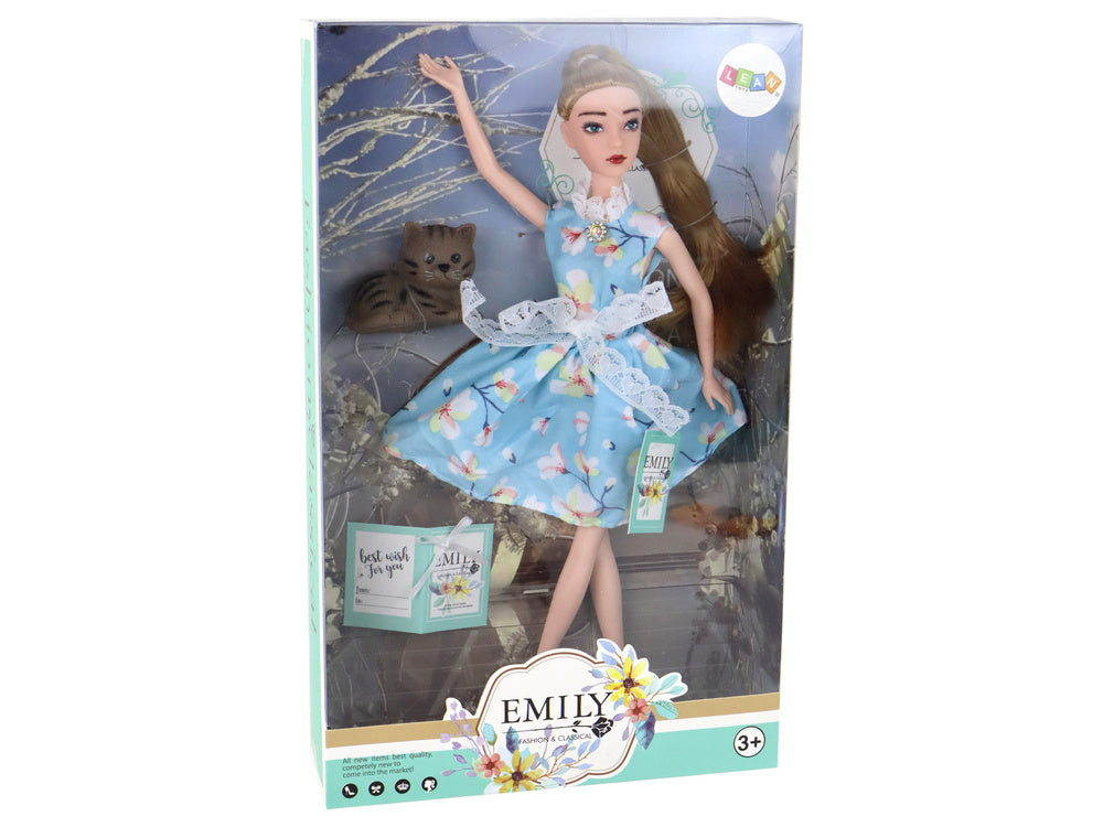 Boneca Emily primavera cabelo comprido azul vestido com gato