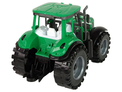 Trator verde com reboque vermelho fricção