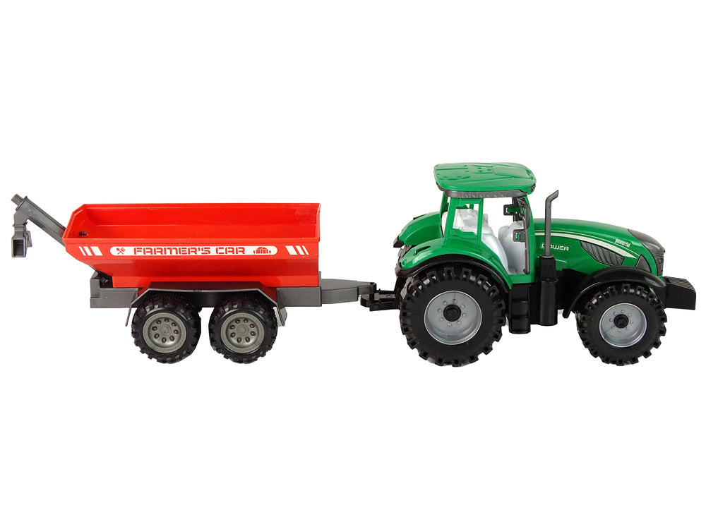 Trator verde com reboque vermelho fricção