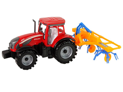 Trator vermelho com ancinho fricção