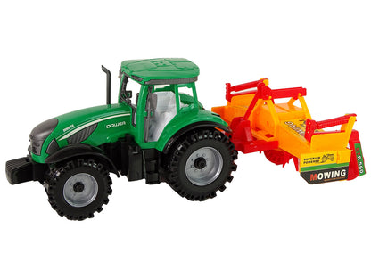 Trator verde com cultivador laranja