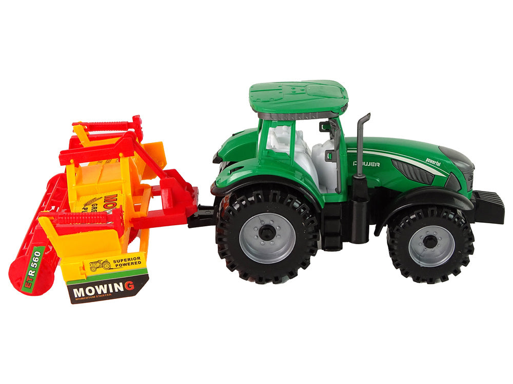 Trator verde com cultivador laranja