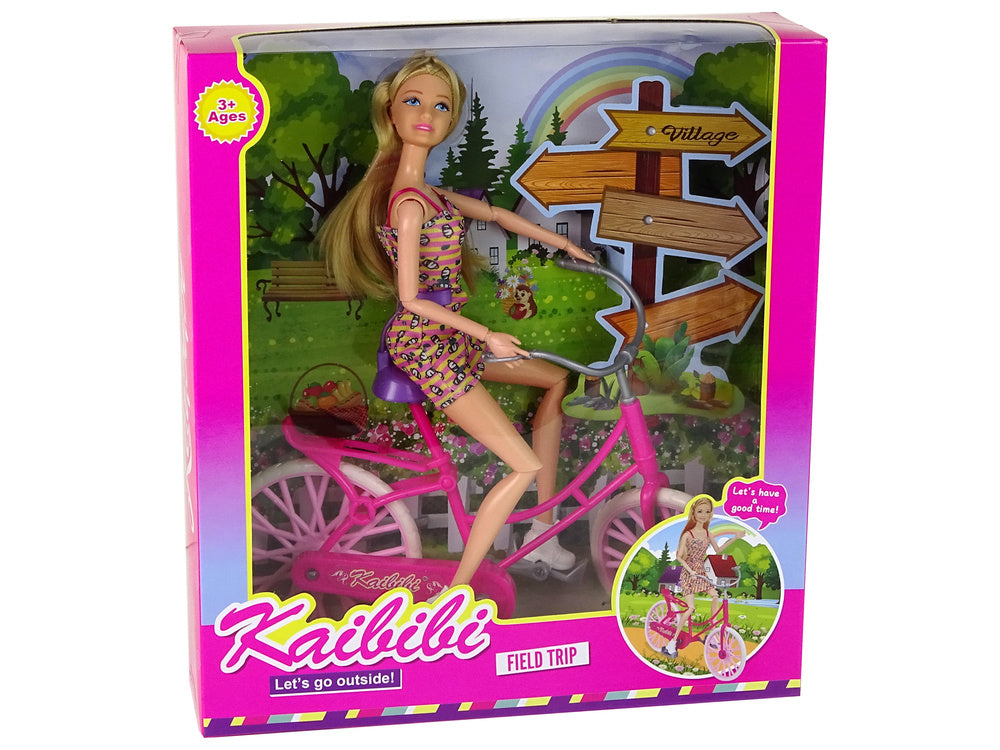 Boneca com bicicleta rosa