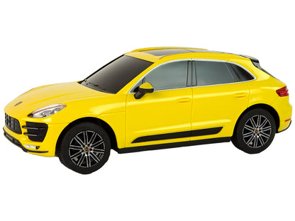 Carro telecomandado Porsche Macan Turbo Rastar amarelo 1:24