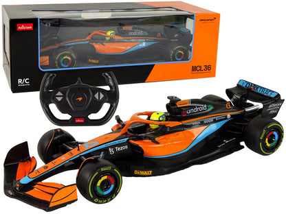 Carro de corrida telecomandado McLaren F1 laranja 1:12