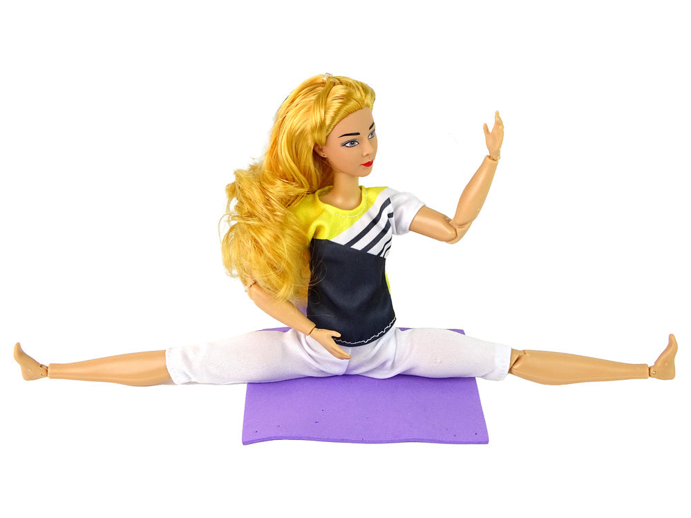 Boneca bebé com tapete de ioga e cabelo loiro comprido