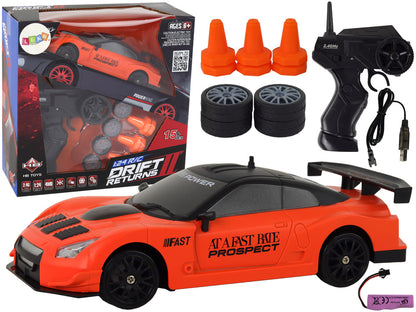 Carro Desportivo RC 1:24 Laranja com Rodas Intercambiáveis
