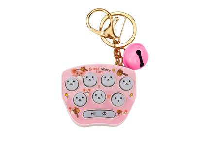 Jogo eletrónico portátil chaveiro Pop It rosa