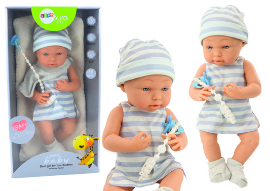 Boneca bebé roupa azul e branca com babete e manta