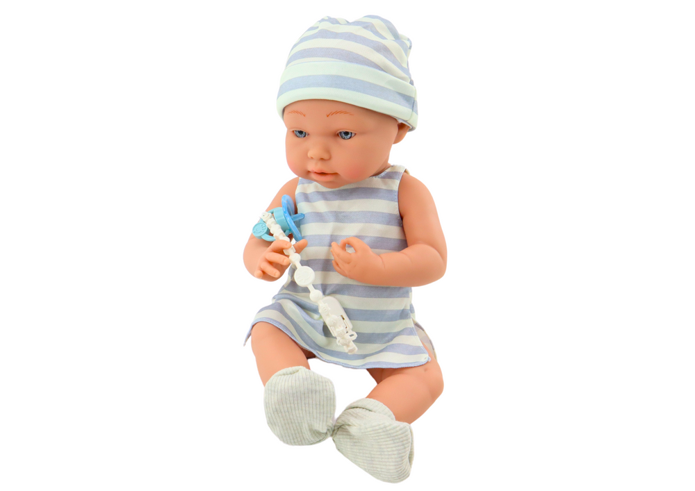 Boneca bebé roupa azul e branca com babete e manta