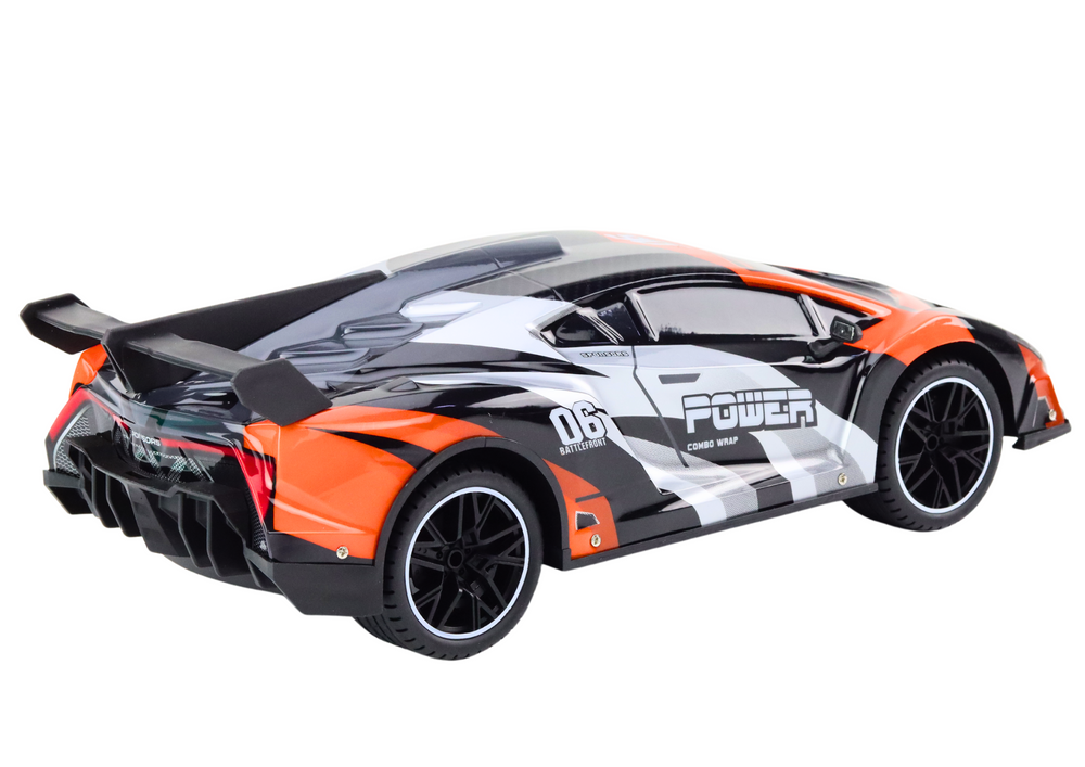 Carro desportivo RC 1:10 laranja velocidade até 25 km/h