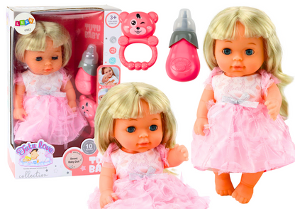 Boneca vestido rosa claro com xixi e chocalho som