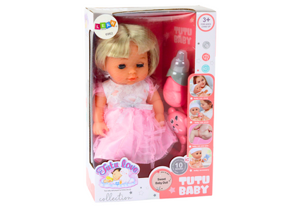Boneca vestido rosa claro com xixi e chocalho som