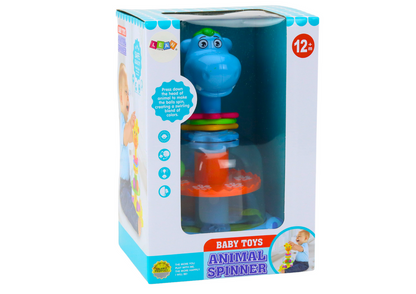 Pião hipopótamo com bolas azul bebé
