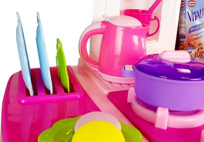 Cozinha rosa com água panelas alimentos som